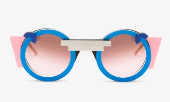 Nina Mûr 'Nathalie' wood eyeglass frame in a blue and pink medley. Designed and made in Madrid, Spain. Part of Nina Mûr's "Eighties II" Collection.