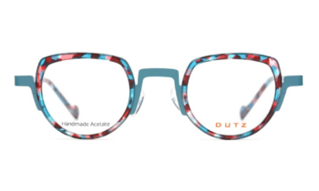 Dutz '2343' metal and acetate eyeglass frame in a matte teal with pink and teal acetate lens rings. Designed and made in the Netherlands.