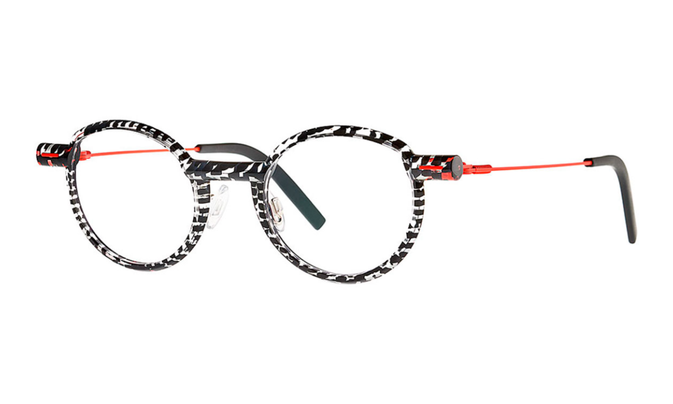 Theo brand eyeglasses in translucent crystal and black pattern, round, temples are fluorescent red metal.