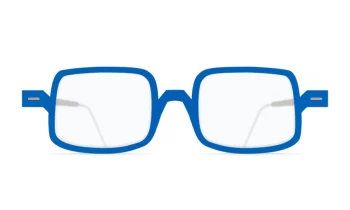 Nina Mûr 'Klee' wood eyeglass frame in a matte, bright blue color. Designed and made in Madrid, Spain.