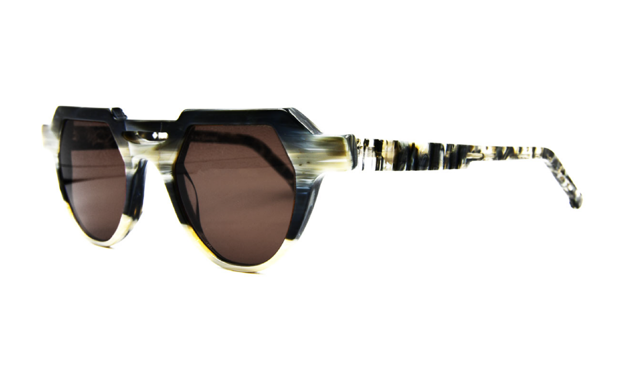 Faniel 'Schubert' recycled acetate sunglass frame of a striated horn pattern. Non polarized gray lenses. Made in Quebec.