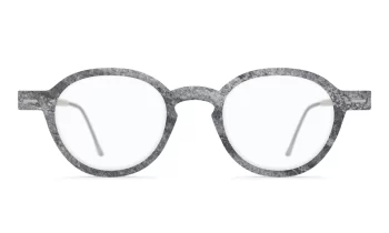 Nina Mûr 'Mamen' wood eyeglass frame in a gray stone finish. Designed and made in Madrid, Spain.